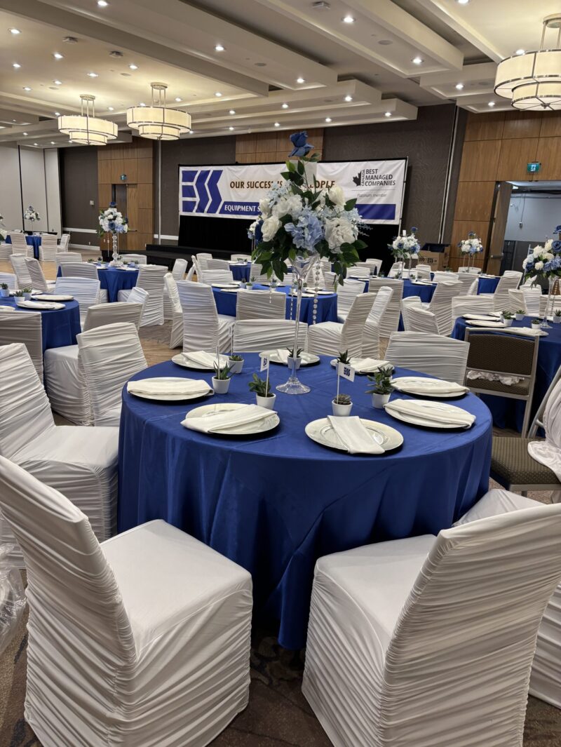 Blue and white corporate event setup by Mosaic Event & Party Rentals